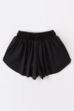Black girl's flowy sports shorts