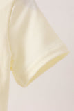 Beige character french knot top