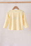Beige character embroidery top