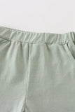Sage basic ruffle shorts