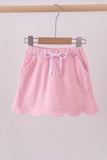 Pink scallop hem bow skort