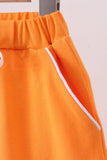 Orange scallop hem bow skort