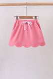 Deep pink scallop hem bow skort