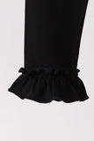Black ruffle pants