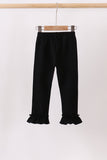 Black ruffle pants