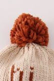 Beige pompom hi cable beanie hat