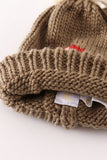 Brown pompom mushroom cable beanie hat