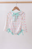 Green castle cream ruffle rashguard