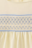 Cream smocked ruffle dress
