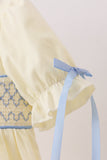 Cream smocked ruffle dress